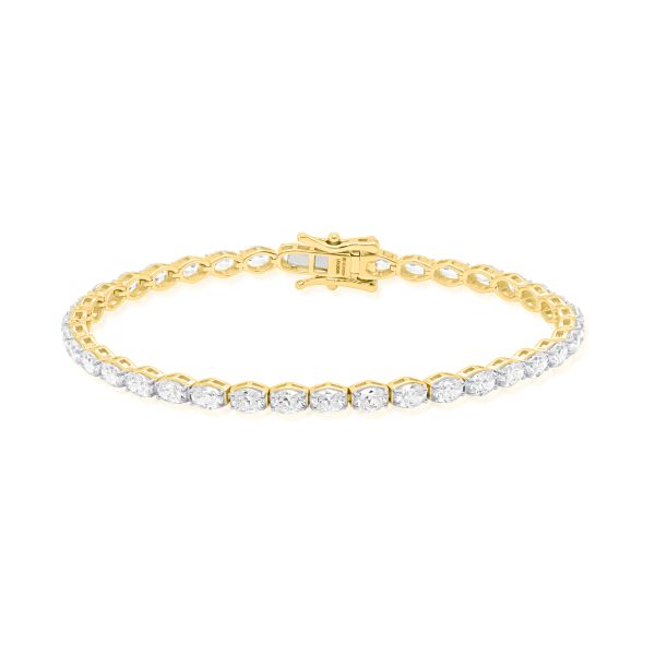 lab grown diamond tennis bracelet with oval shape diamonds in 14k yellow gold