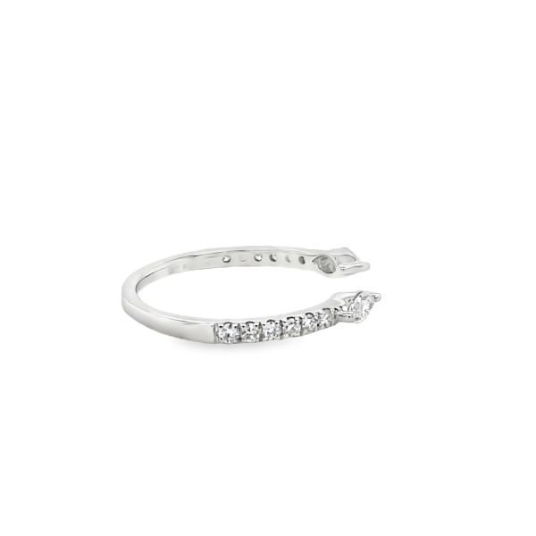 lab grown ring with small diamonds set in 14k white gold on a white background