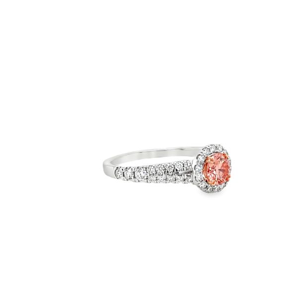 lab grown diamond ring with round cut pink diamond in the center and halo with white diamonds in 14k white gold Side picture