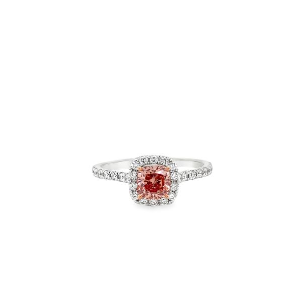 lab grown diamond ring with  cushion cut fancy pink diamond in the center and halo with white diamonds in 14k white gold
