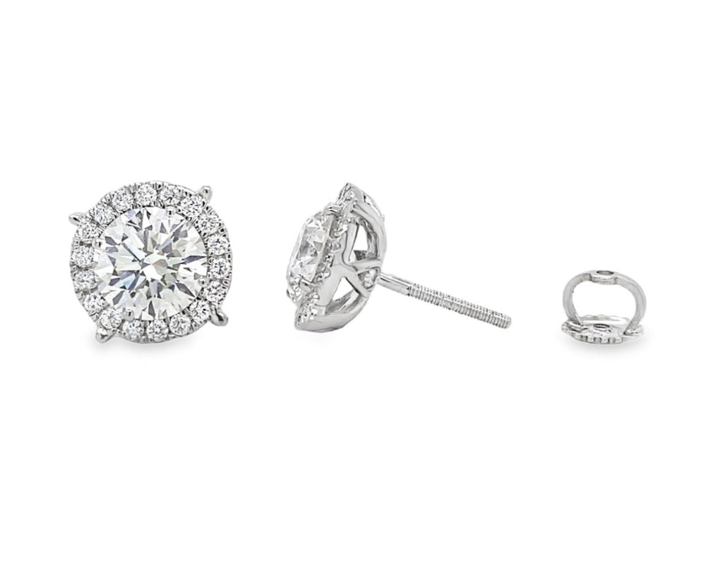lab grown studs in halo setting in platinum front and side picture