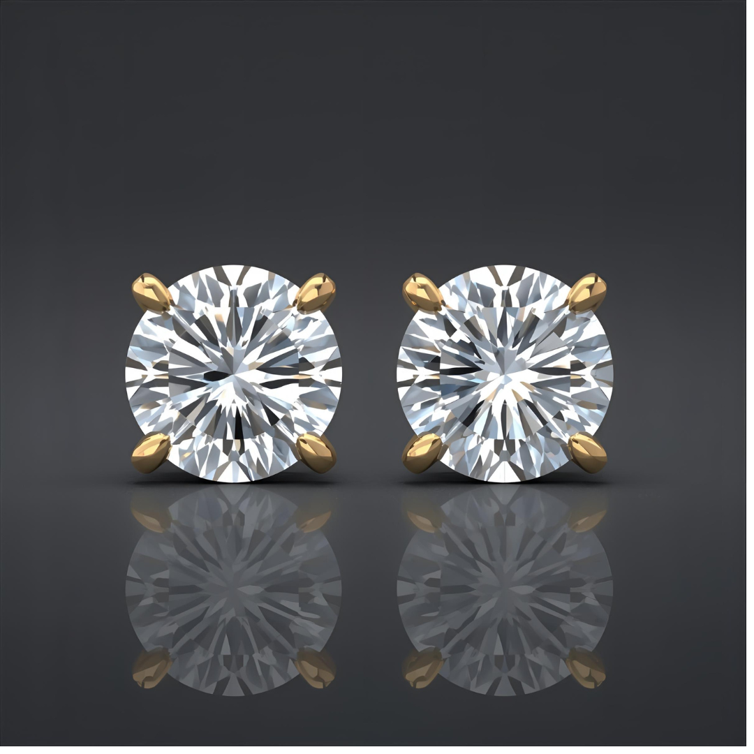Pair of lab grown diamond stud earrings with gold prongs on a reflective surface.