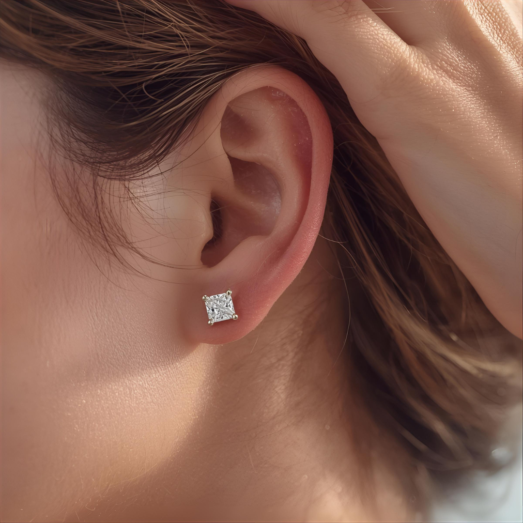 Lab Grown Diamond Princess Cut Close-up of woman wearing a princess cut diamond stud 