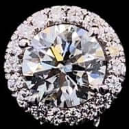 Pair of diamond stud earrings on a black background